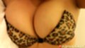 Wearing leopard print bra