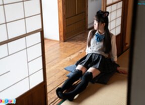 Ria Kurumi in knee high stockings rubbing her pussy