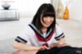 Suzumiya aika kneeling in uniform pulling cock out looking up