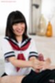 Suzumiya aika kneeling stroking spent cock cum on her hand wearing kogal uniform
