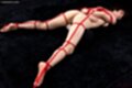 Mizuki lying on her front nude bound with rope legs spread